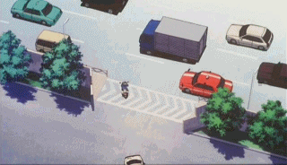 도로에서 오토바이와 자동차가 합류하는 장면